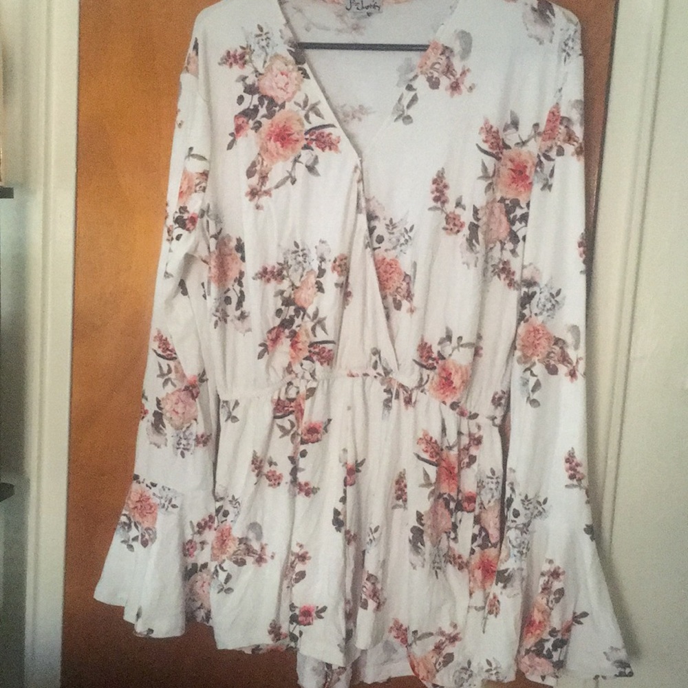 Long sleeve flower romper.  Worn once